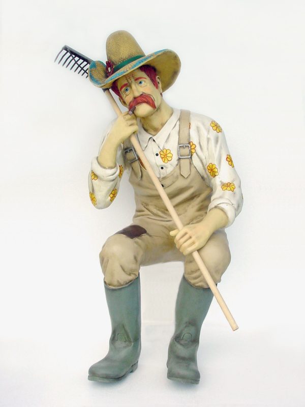GARDENER MALE W/ RAKE SITTING