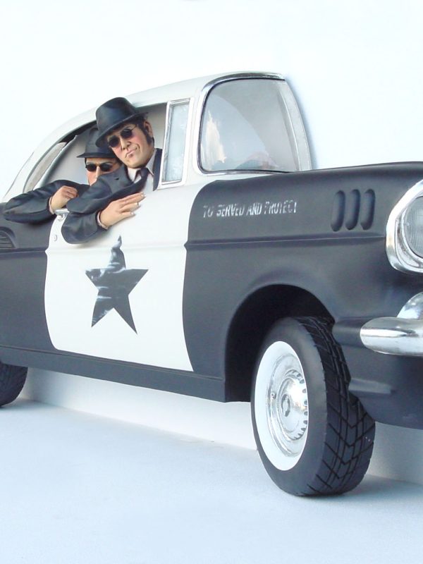 POLICE CAR WITH DANCING BROTHERS