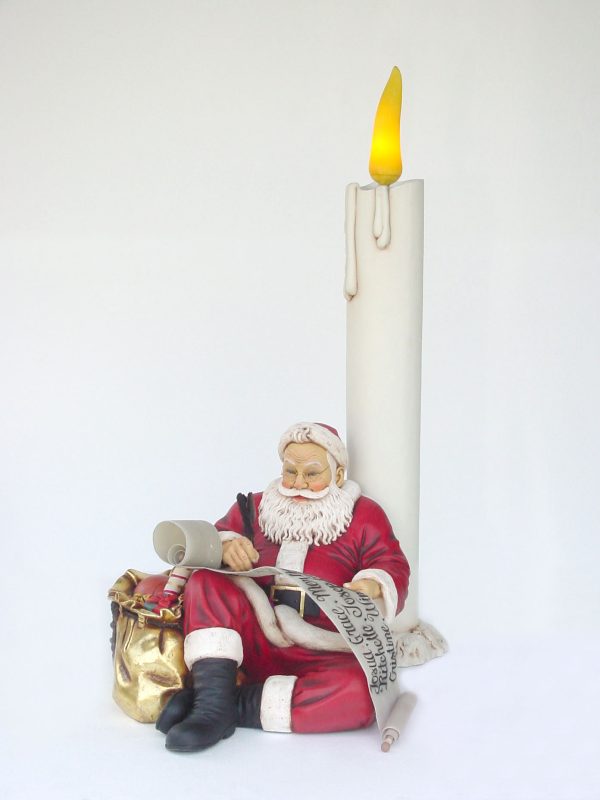 SANTA CLAUS SITTING WITH CANDLE