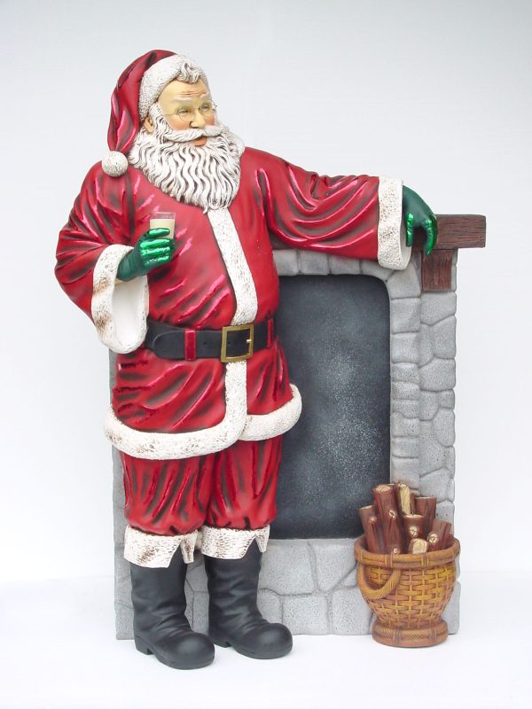 SANTA STANDING BESIDE A CHIMNEY