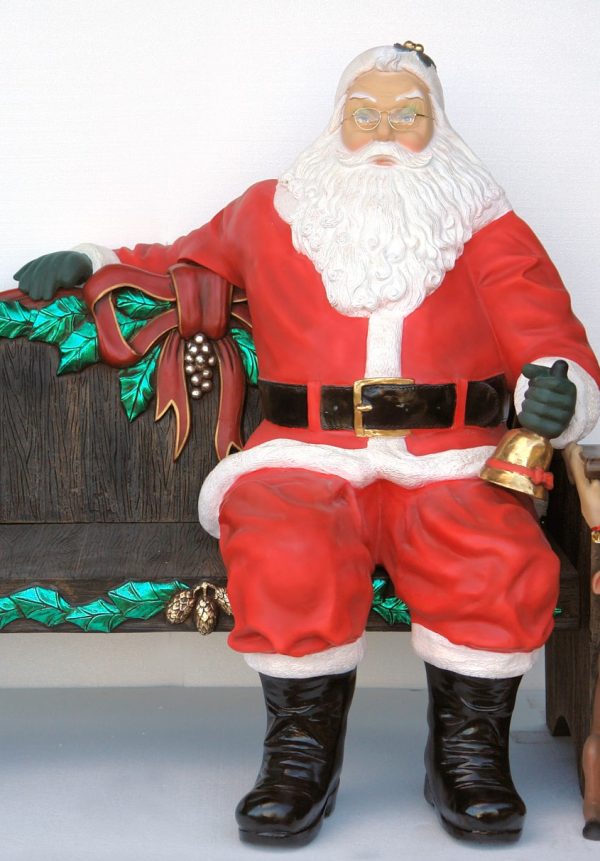 Santa Claus sitting for X'mas Bench