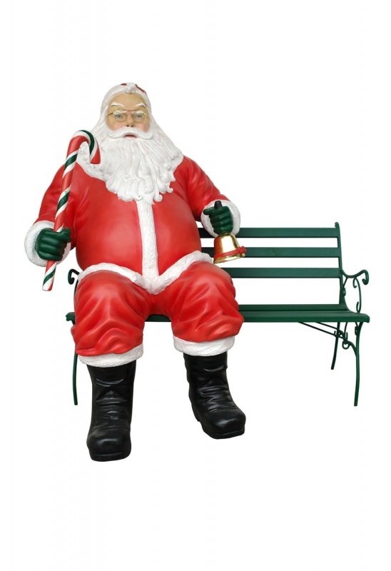 Santa Claus with Candy Cane sitting on Bench