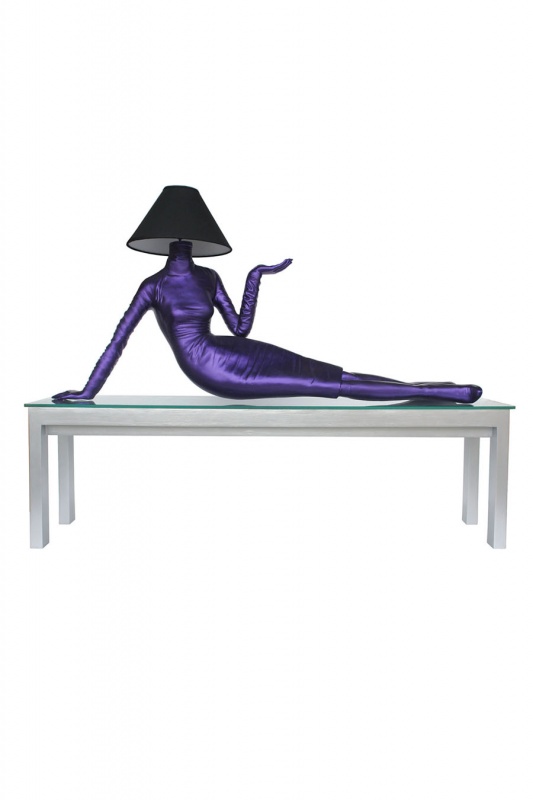 LADY LAMP LYING ON LONG SIDE TABLE WITH STONES AND GLASS (WOOD)