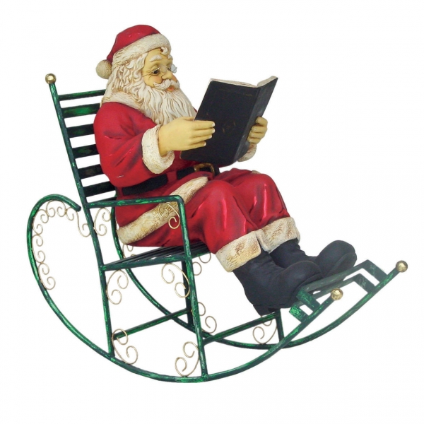 Santa Claus sitting with Book