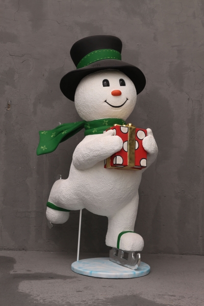 SNOWMAN SKATING WITH GIFT