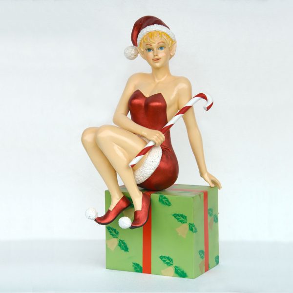 LADY ELF SITTING ON GIFT BOX