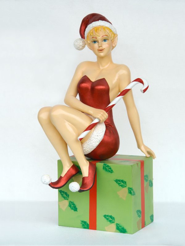 LADY ELF SITTING ON GIFT BOX
