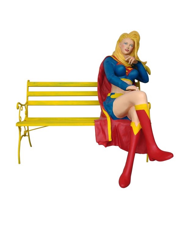 MUSCLE GIRL SITTING ON BENCH
