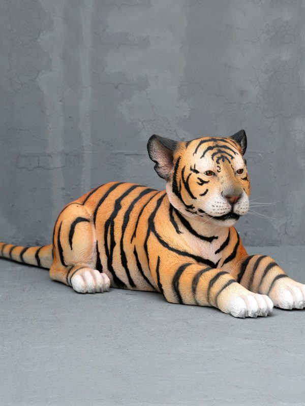 TIGER CUB LYING