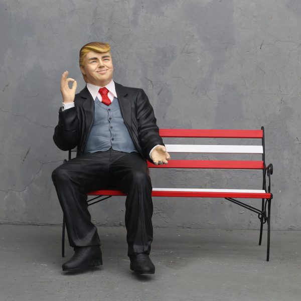 DONALD TRUMP SITTING ON BENCH