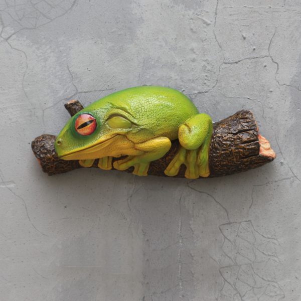 FROG ON TREE BRANCH